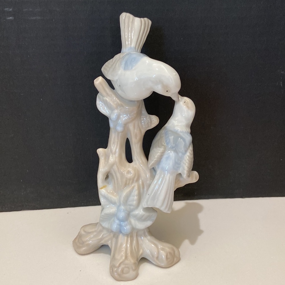 Blue and white porcelain birds in trees figurine